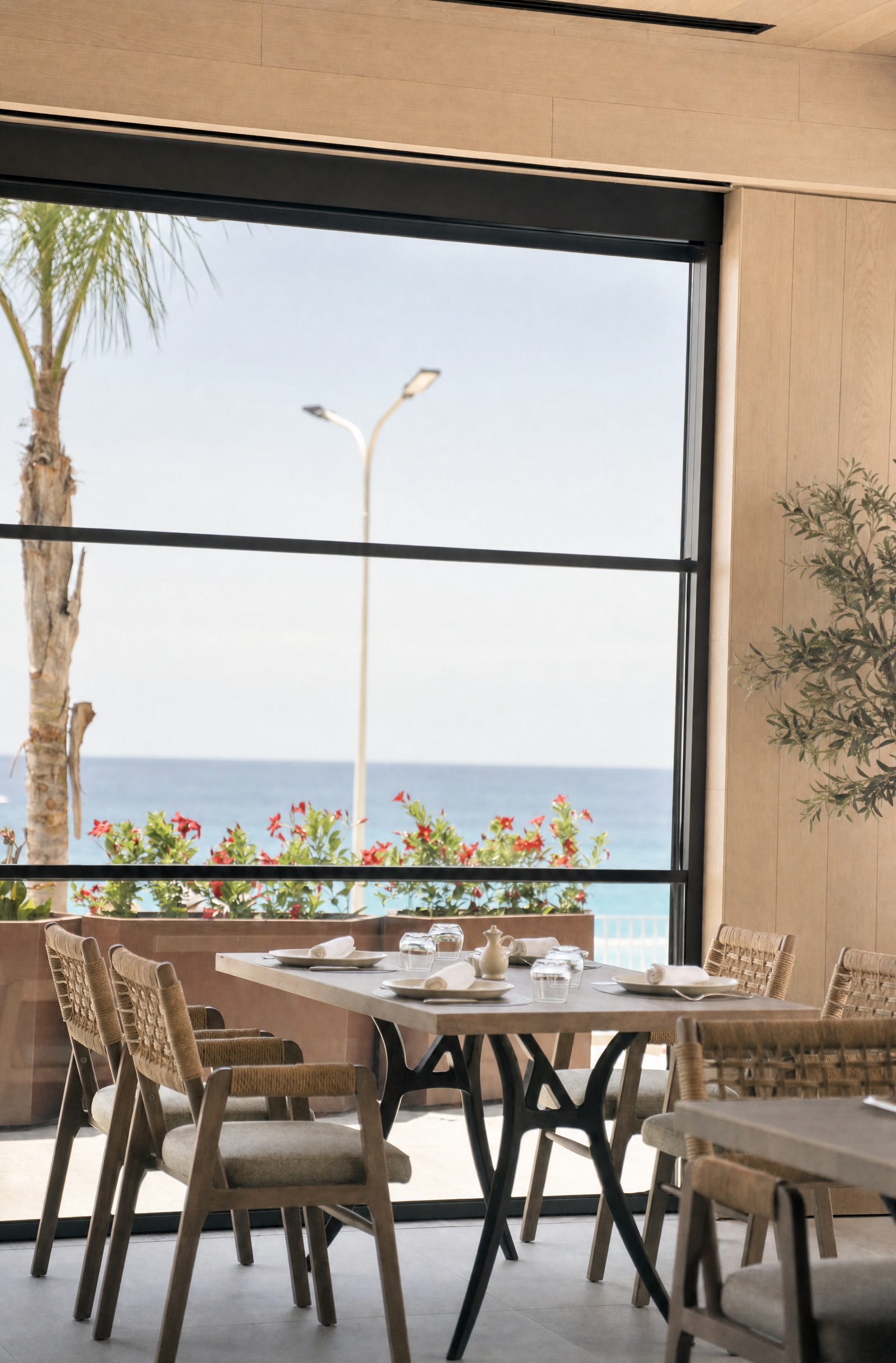 Piazza — a table set against the open sea
