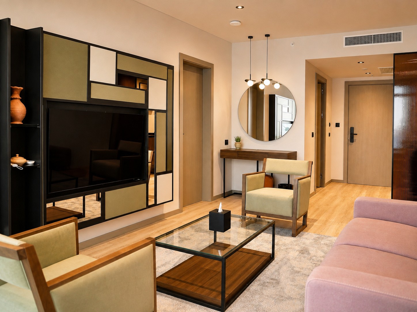 Signature Suite — the living area and its graphic cabinet wall